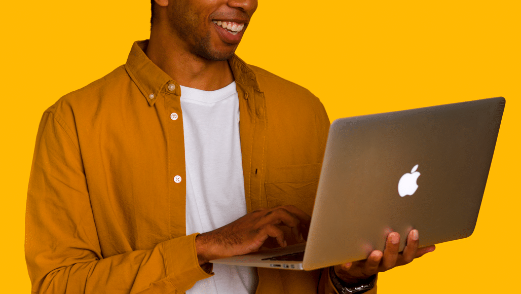 CLARUS Partner Mike Jones holding laptop