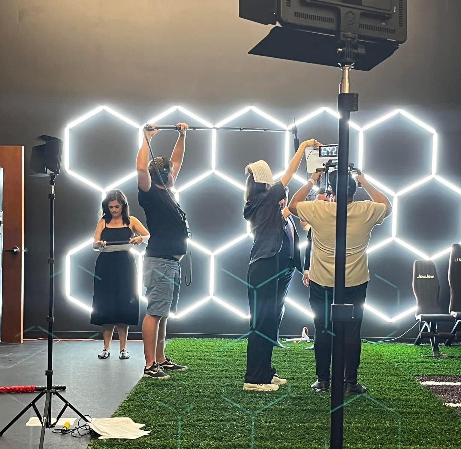 Production crew filming lawyer TV advertising
