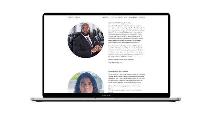A MacBook Pro displays a law firms team page featuring profile photos and bios of two professionals, one man in a suit and one woman with dark hair, against a white background.